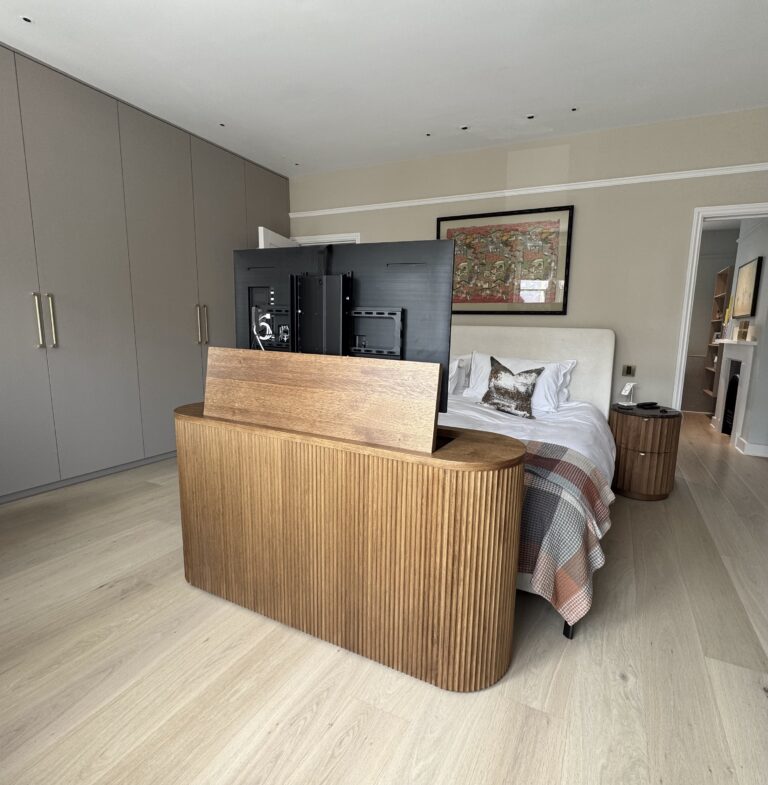 Oak curved tv lift cabinet with fluted panels